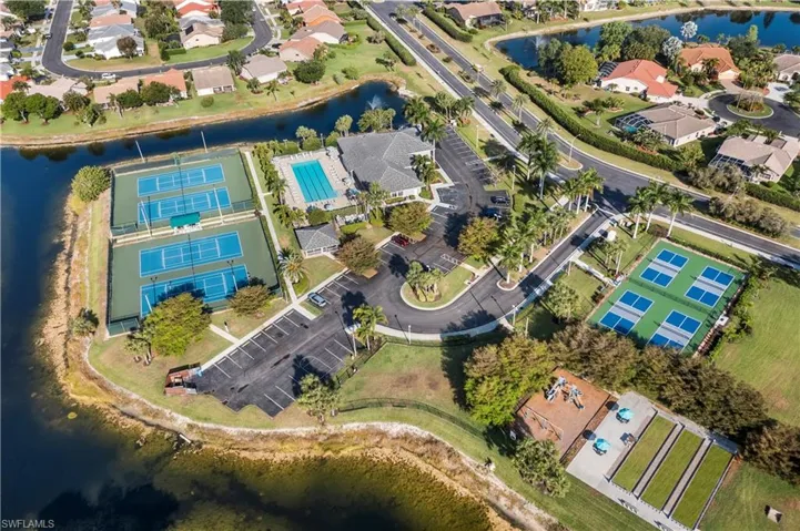 Aerial view with a residential view and a water view
