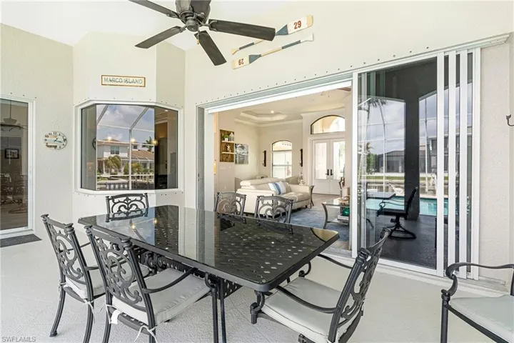View of patio / terrace with ceiling fan and outdoor dining space