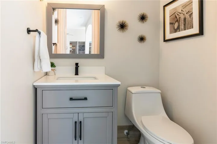 Bathroom featuring toilet and vanity