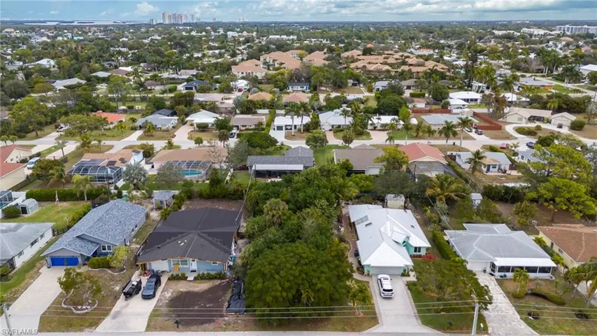View of property location with nearby suburban area