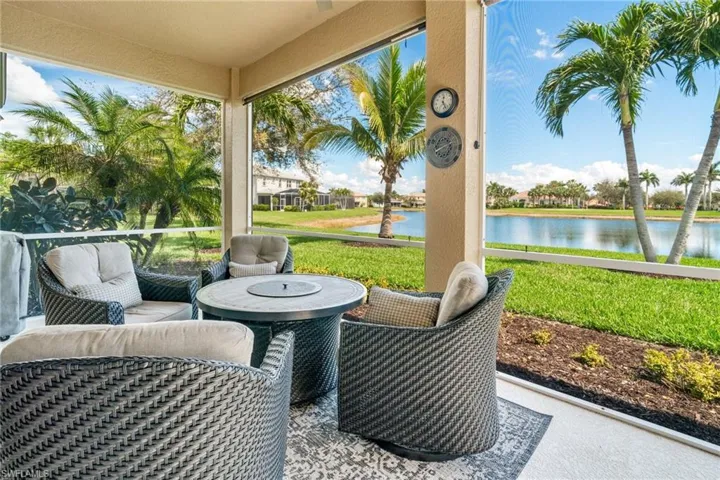 Sunroom with a water view