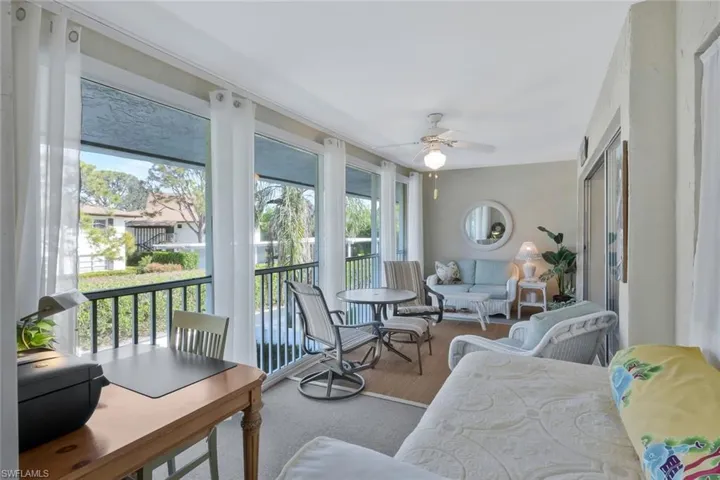 Large enclosed lanai with sliding glass doors to let in the gulf breezes and views of the Park Shore neighborhood.n