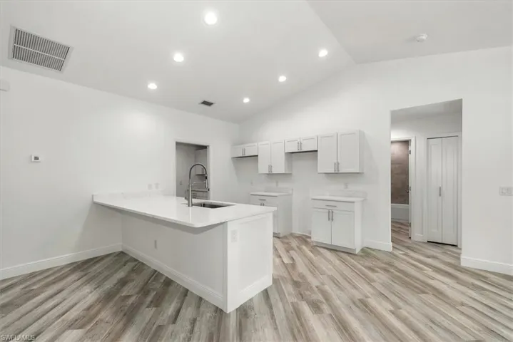 Large kitchen bar gives lots of room to eat in or entertain buffet style.
