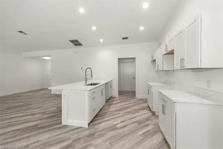 kitchen toward laundry and garage