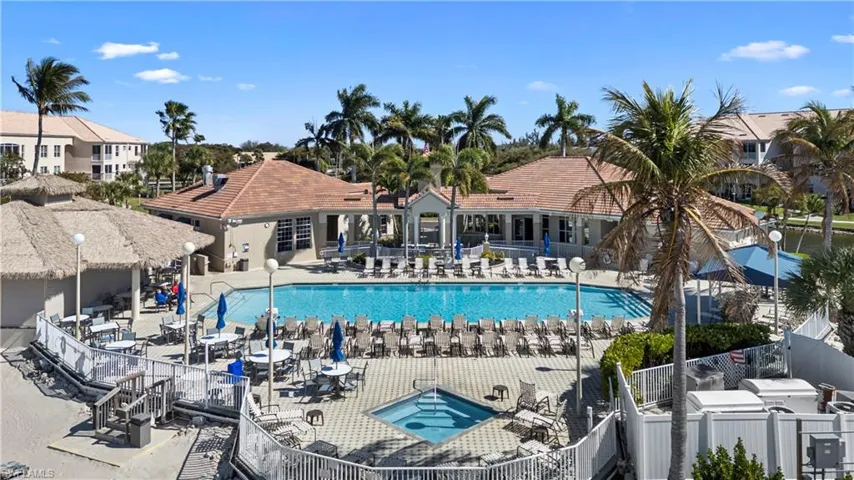 Community pool featuring a patio