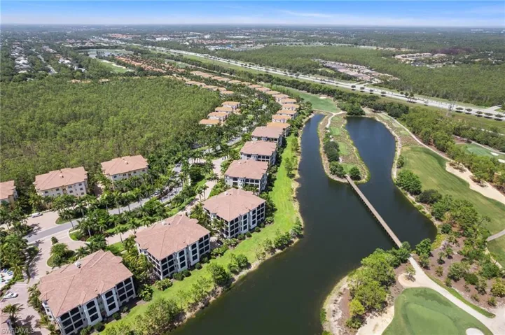 Aerial view of a nearby body of water and a golf course