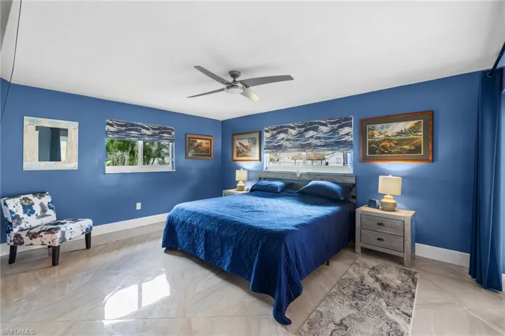 Bedroom featuring baseboards and a ceiling fan