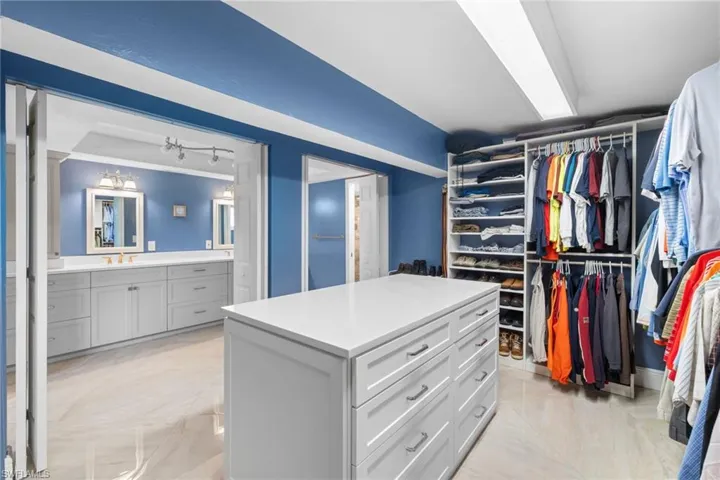 Walk in closet with a sink