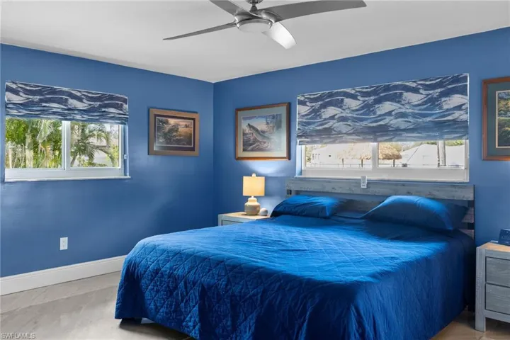 Bedroom featuring baseboards and a ceiling fan
