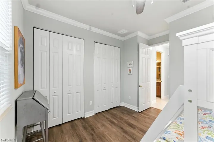 BUNK ROOM HAS TWO CLOSETS, DECK, AND BOTTOM BUNK IS A FULL AND TOP IS A TWIN. YOU CAN SEE BATHROOM IS JUST OUTSIDE THE BEDROOM DOOR