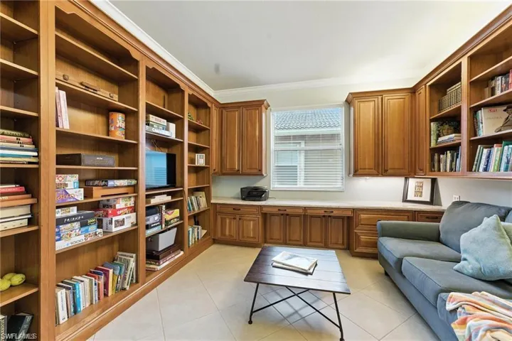 LARGE OFFICE WITH BUILT-INS, PULL OUT COUCH, DESK, AND ROOM FOR MORE BOOKS!