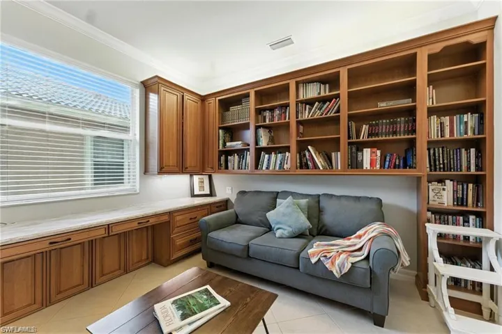 LARGE OFFICE WITH BUILT-INS, PULL OUT COUCH, DESK AREA FOR 2 , AND ROOM FOR MORE BOOKS!