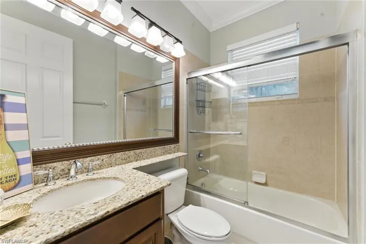 FRONT BATHROOM HAS SHOWER/TUB COMBO AND THIS ONE IS NEAR THE FRONT OF THE HOUSE - HAS A WINDOW