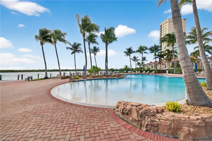Community pool featuring a patio area