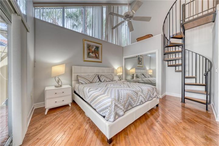 Primary bedroom with a loft