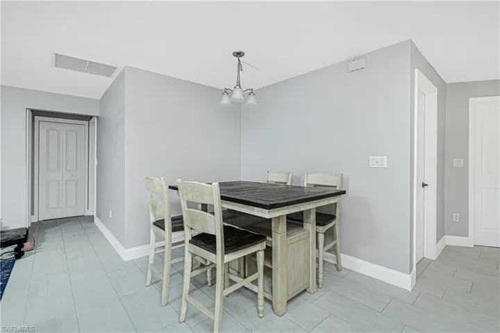 Dining room with a notable chandelier