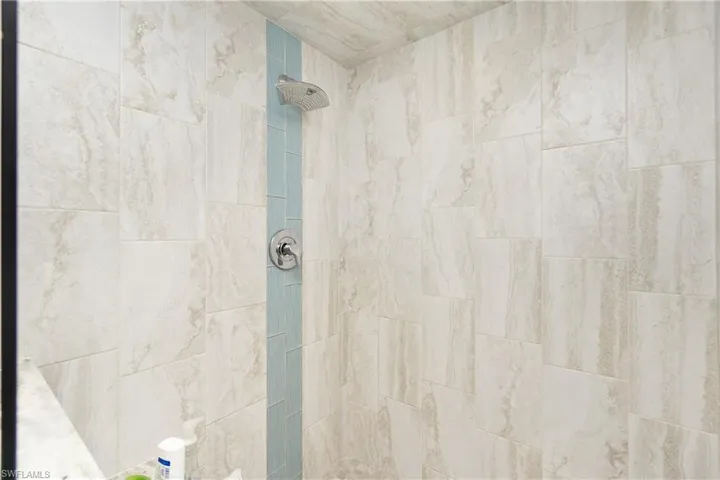 Bathroom with tiled shower
