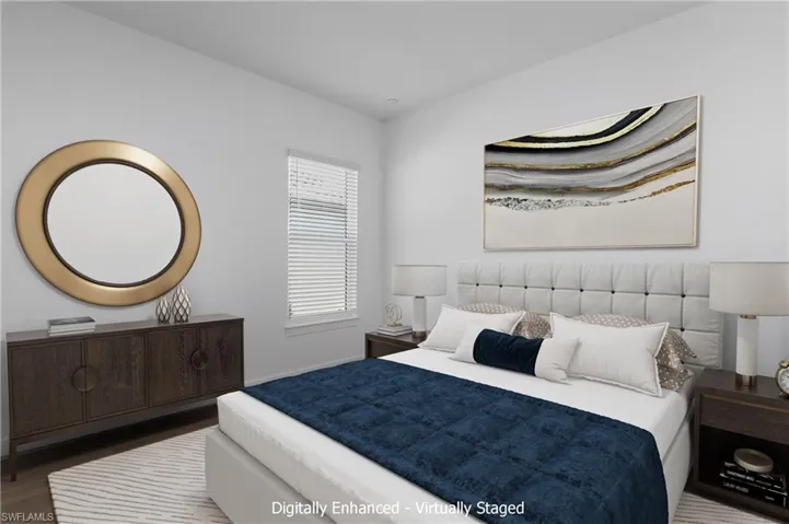 Bedroom featuring wood-type flooring