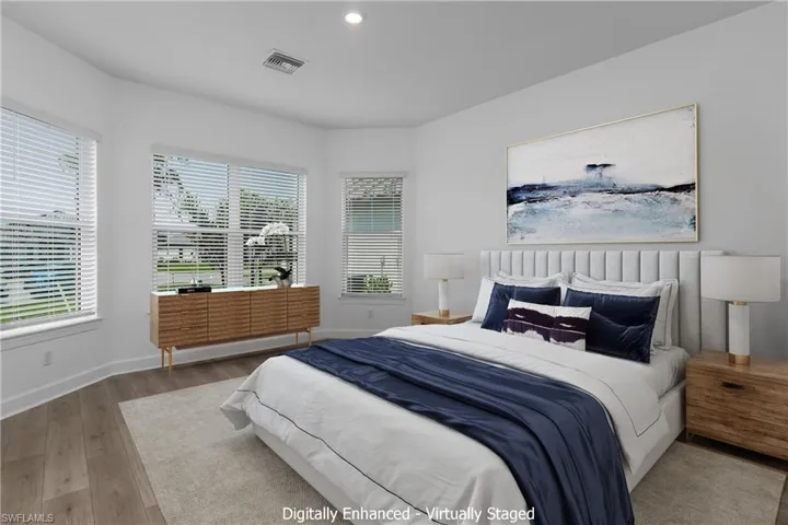 Bedroom featuring hardwood / wood-style flooring