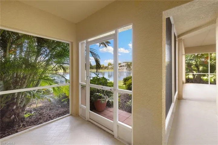 Extended Screened Covered Lanai and Door- Walkway to Garage