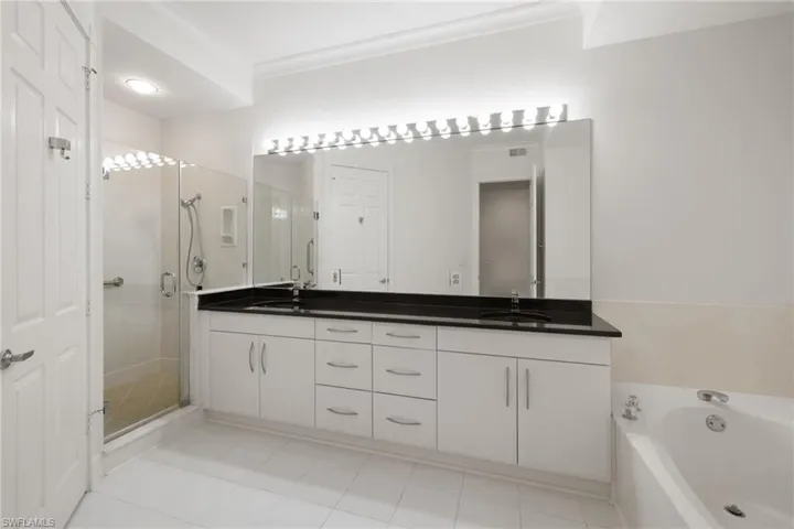 Primary Bathroom with Dual Sinks and Separate Shower