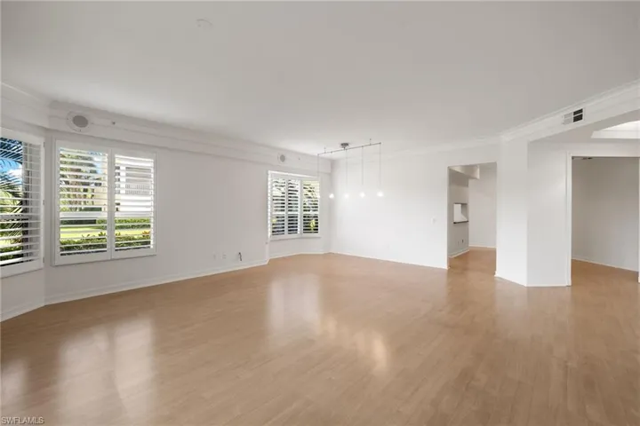 Dining Room with Bay Window and Plantation Shutters