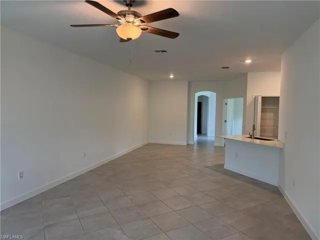 View from the living room into the dining area and kitchen