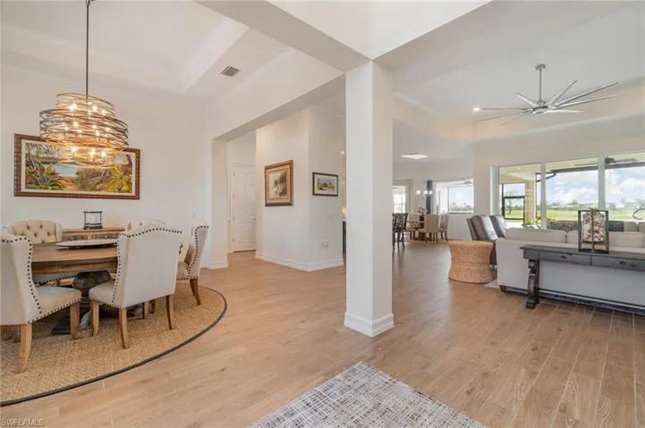 Dining area featuring  tiled flooring,  and crown molding