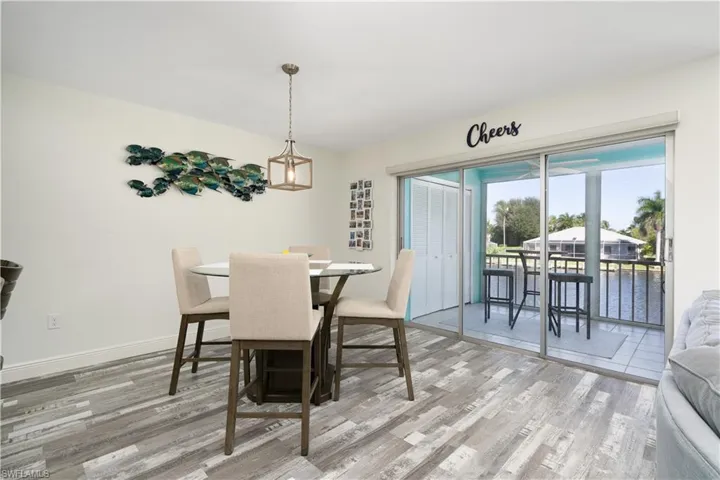 Dining space featuring light wood-style floors and baseboards