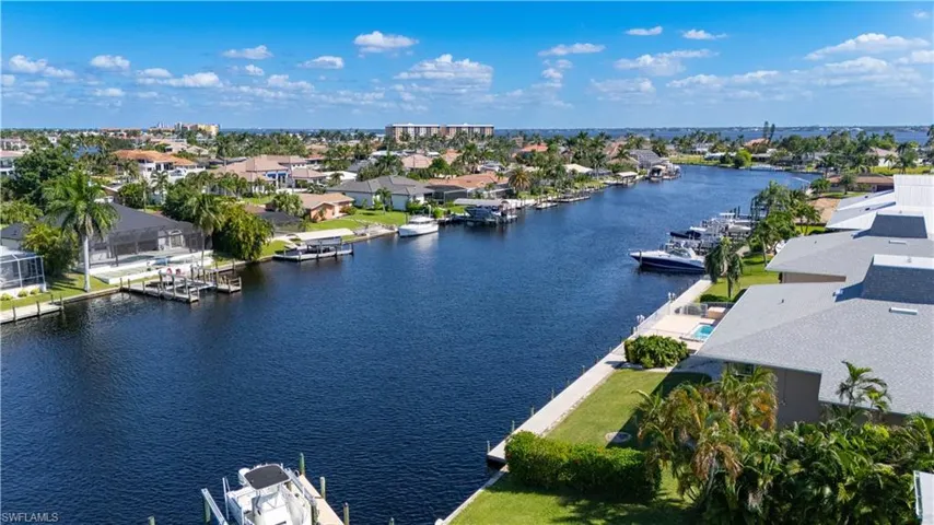 Aerial view of residential area with a large body of water