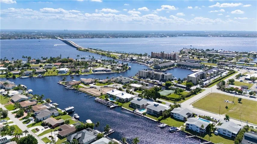 Aerial view of residential area with a nearby body of water