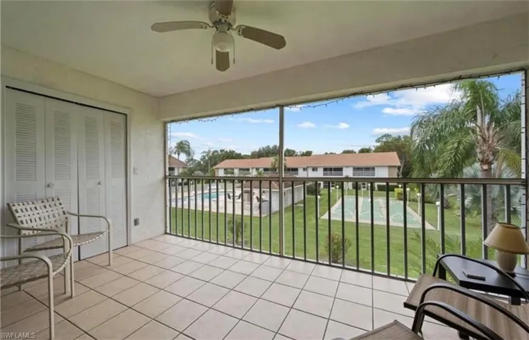 Sunroom featuring tile patterned flooring