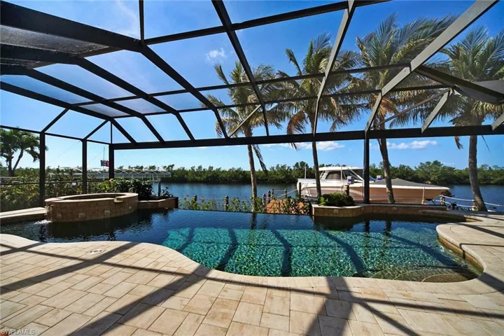 Infinity edge pool & spa boast panoramic views of the Spreader & Preserve
