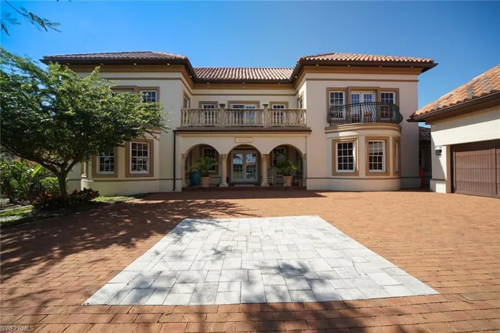 Outstanding curb appeal featuring french doors, Juliet balconies off Guest bdrms on either side of spacious Master balcony.
