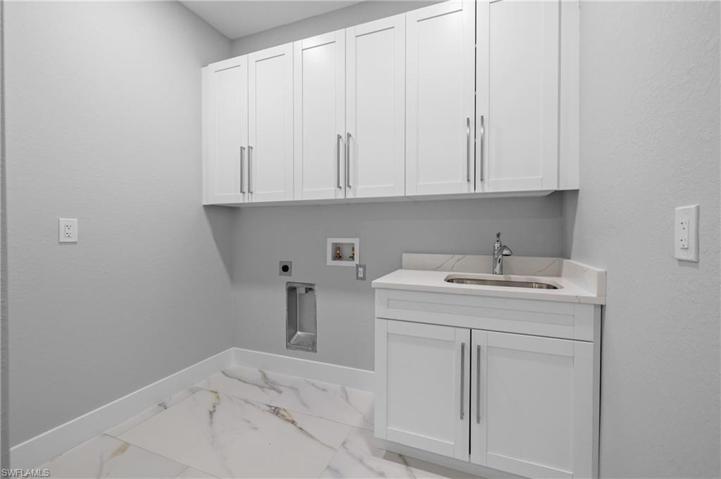 Laundry room is off the Kitchen