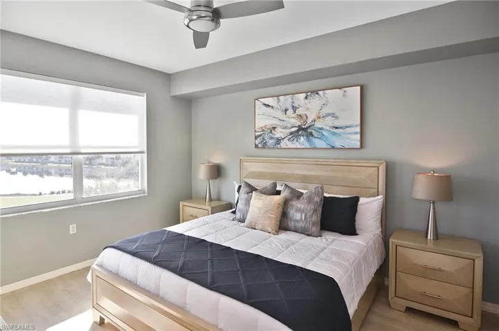 Bedroom featuring wood finished floors and ceiling fan