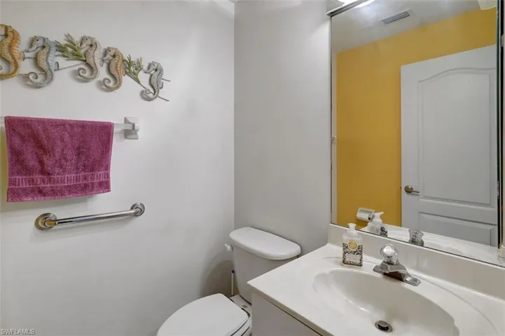 1/2 bathroom off the garage and living area