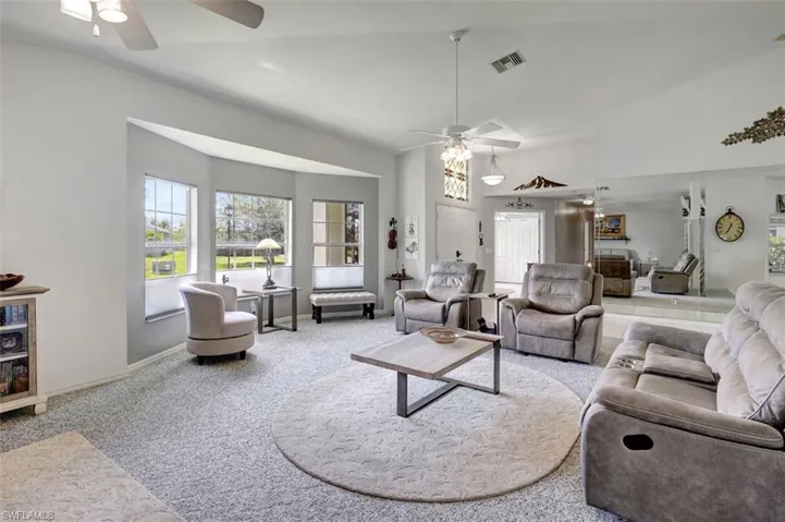 Great room with sliders to screened lanai