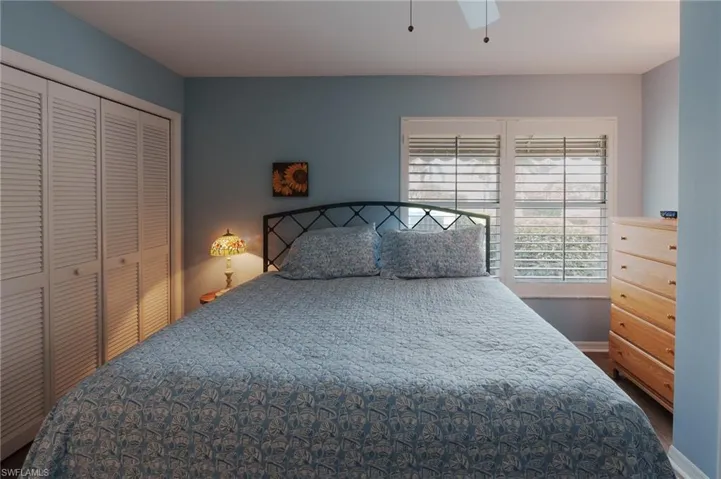 Bedroom featuring a closet and ceiling fan