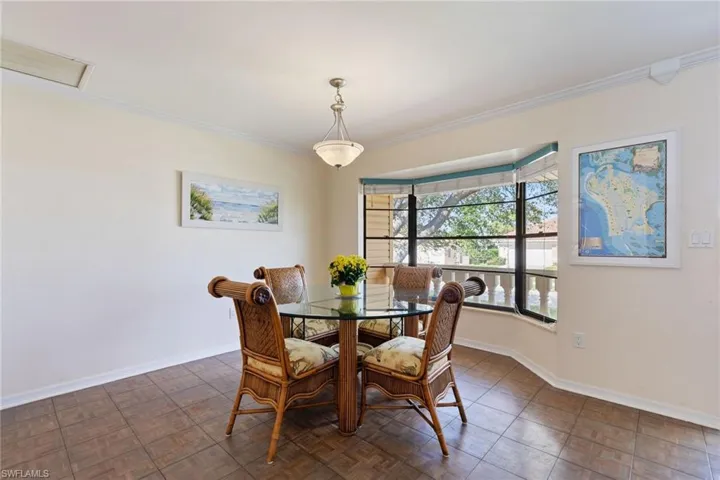 Dining room featuring crown molding