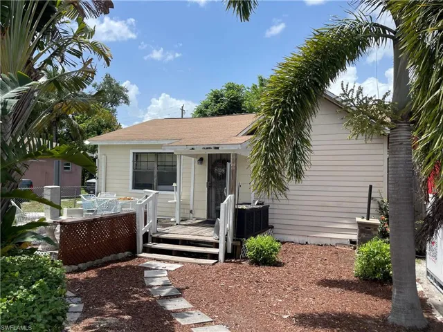 View of front of property featuring a deck