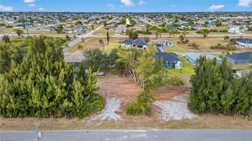 View of property location featuring nearby suburban area