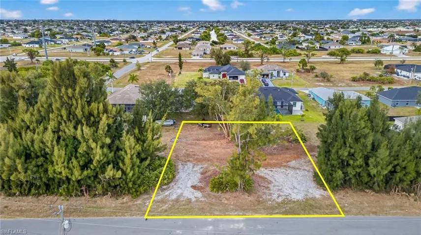 Aerial perspective of suburban area with property parcel outlined