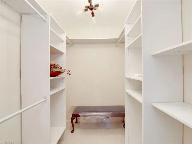 View of walk-in master closet