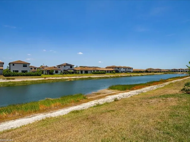 Water view featuring nearby suburban area