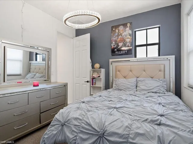 Bedroom with carpet flooring