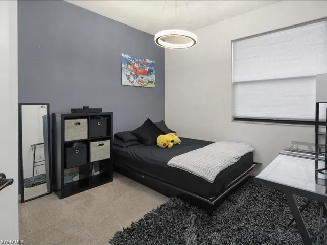 Bedroom with carpet