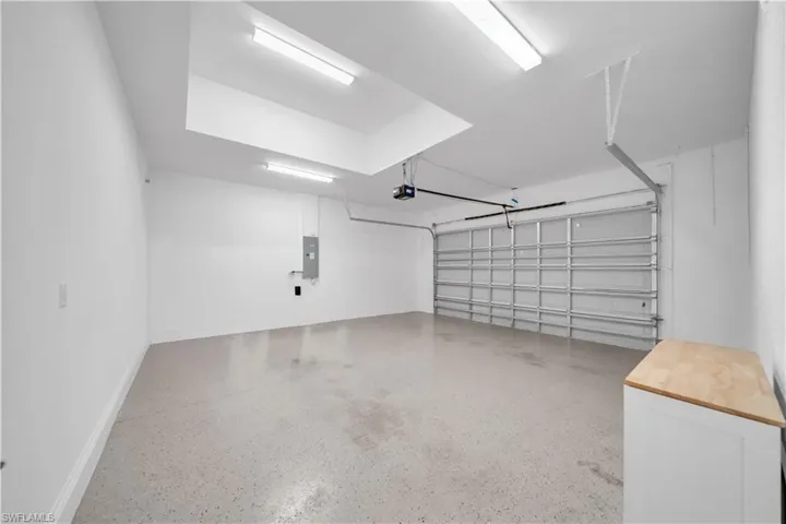 Garage featuring electric panel