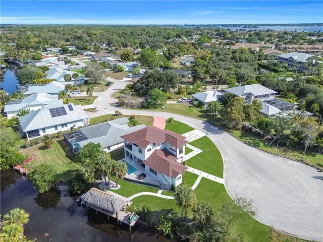 View of property location featuring nearby suburban area and a large body of water