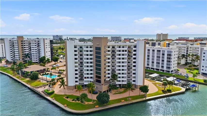 Aerial view of Harbour Pointe with canals to Estero Bay - Virtually Edited Image
